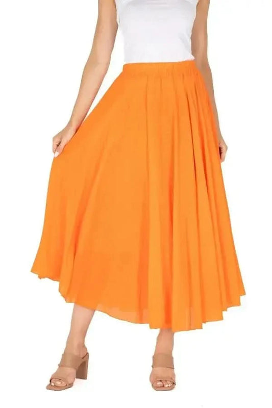 The sentence could be rewritten as: Rear view of a person in a white top and stylish M Made In Italy Tangerine Woven Skirt, paired with beige high heels.