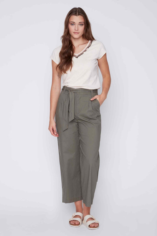 The model is wearing CoCo Y Club olive green Side Front Tie Ankle Pants and a white t-shirt from her wardrobe.