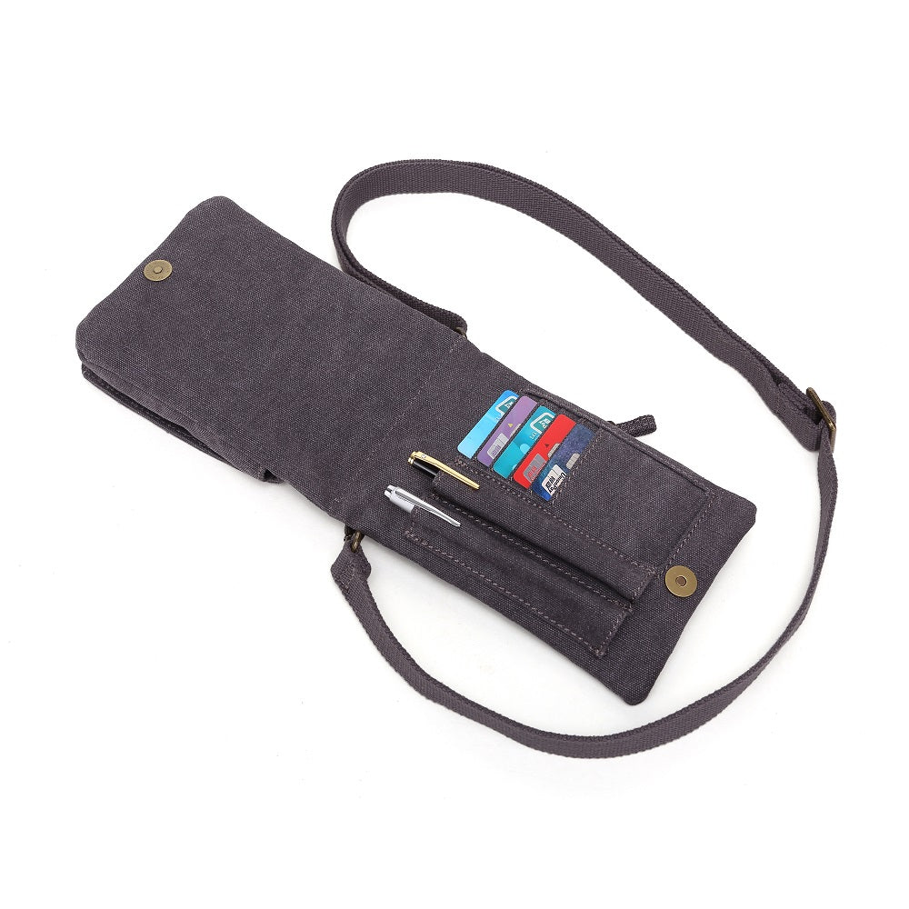 A Davan Khaki Canvas Shoulder Bag MF394A with adjustable straps.