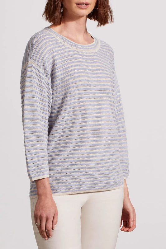 Woman wearing a Tribal 3/4 Sleeve Boat Neck Sweater and white pants.