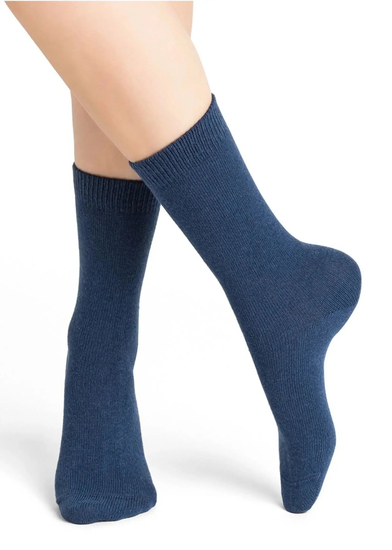 The legs of a woman wearing a pair of Bleuforet 6095 Cashmere Blend Socks.