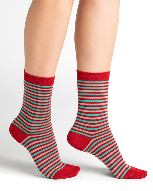 A woman's legs with Bleuforet 6315 Cachemire rayures striped socks known for optimal comfort.