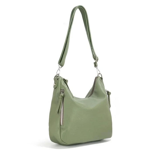 The Megan Hobo Shoulder Bag by Co-Lab features green leather, a beige interior with an inner pocket and zipper, and a partial view of the Co-Lab brand name printed inside.