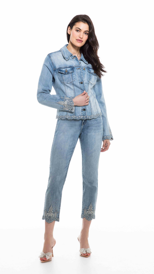 Woman modeling an Orly Lt Blue Detailed Jean Jacket and jeans with lace details, standing against a white background for the Spring collection.