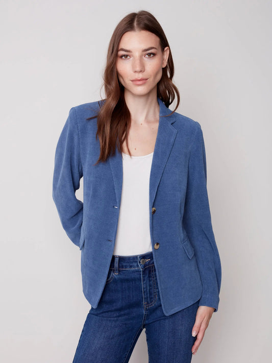 The model is wearing jeans and a Charlie B Buttoned-front Corduroy Blazer.