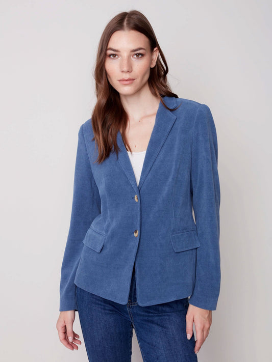 The model is wearing jeans and a Charlie B Buttoned-front Corduroy Blazer.