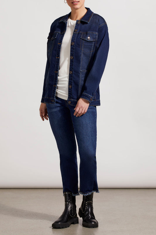 A woman in a comfortable Tribal Denim Jacket with Pockets.