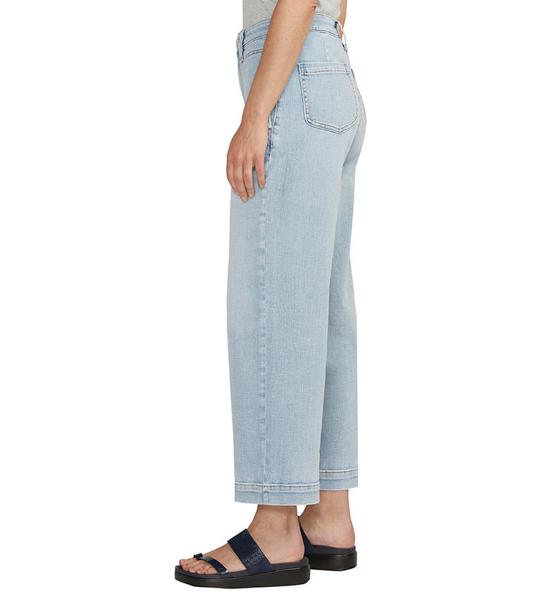 Light-wash Sophia Wide Leg Crop Jeans paired with black sandals by Jag.