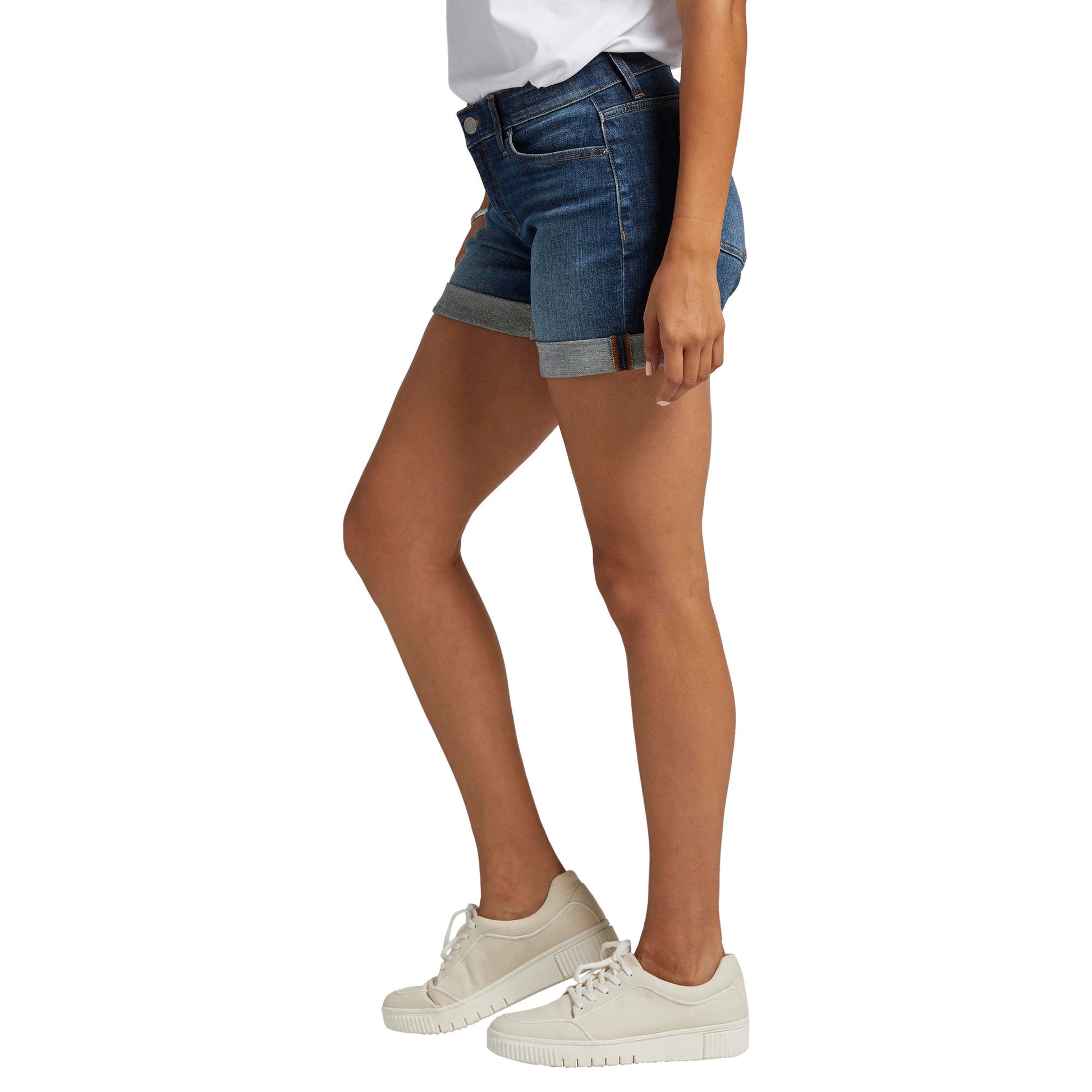 A woman wearing a white t-shirt and Jag elastic waistband Alex Boyfriend Mid Rise Shorts.