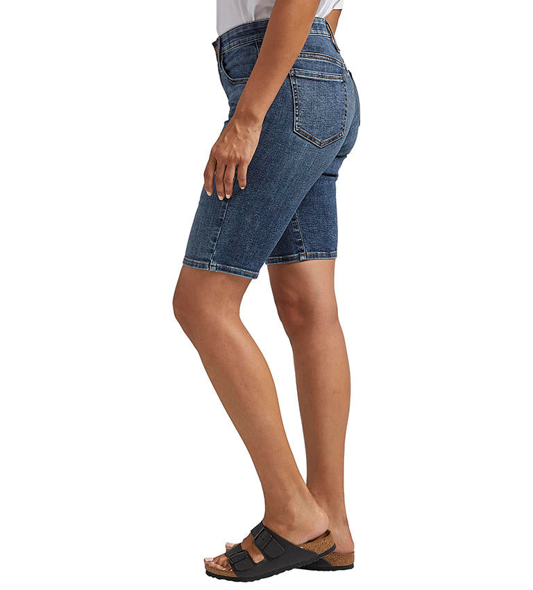 Woman wearing Jag's Cecilia Bermuda shorts with an eco wash and black sandals.
