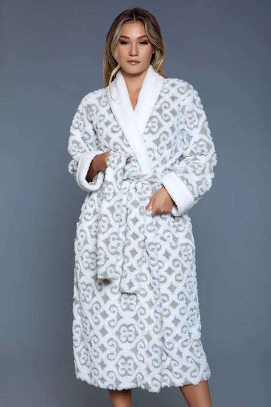 A woman wearing a BeWicked Kimmie Robe 2069 with a tie closure in ultra-soft flannel.