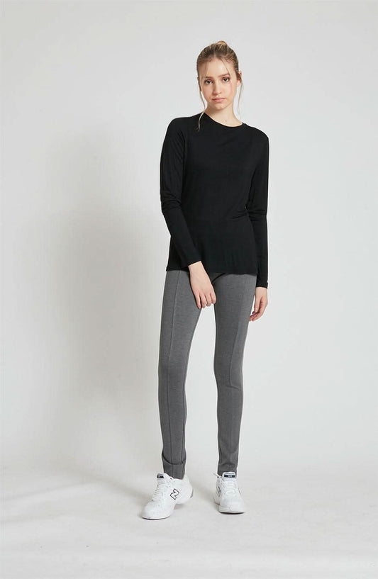 A woman wearing a Point Zero MOL4108 - Basic Top.