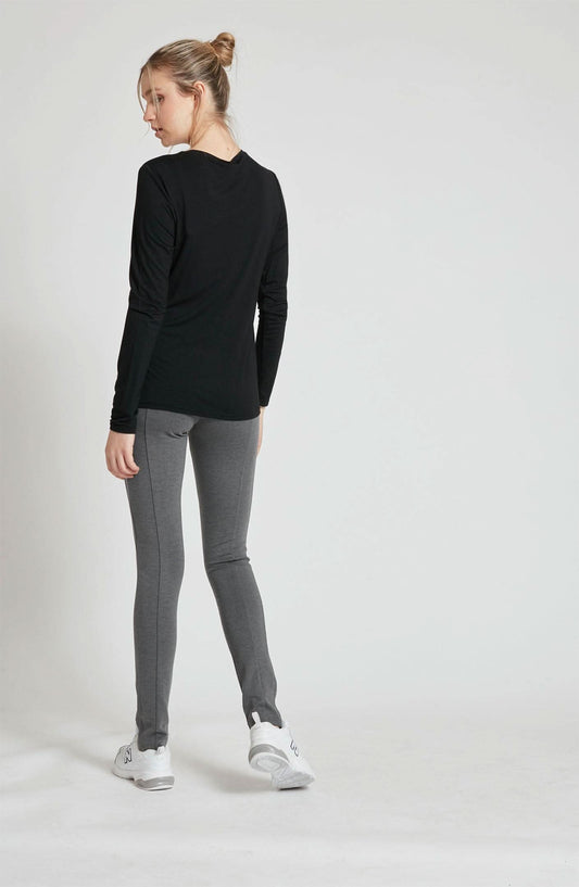 A woman wearing a Point Zero MOL4108 - Basic Top.