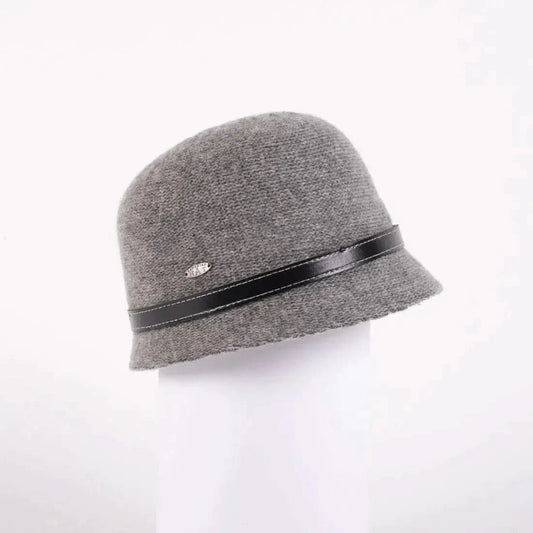 A woman wearing a Canadian Hat Grey Camina- Small Bell with leather belt.