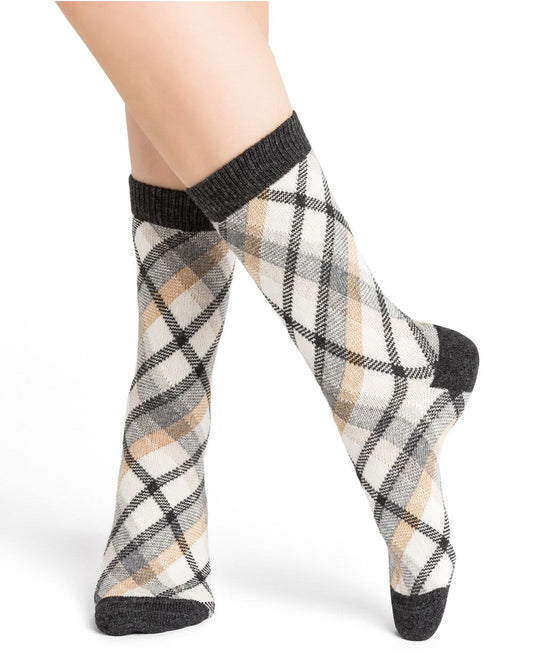 A woman's legs with Bleuforet Argyle Cashmere Socks.