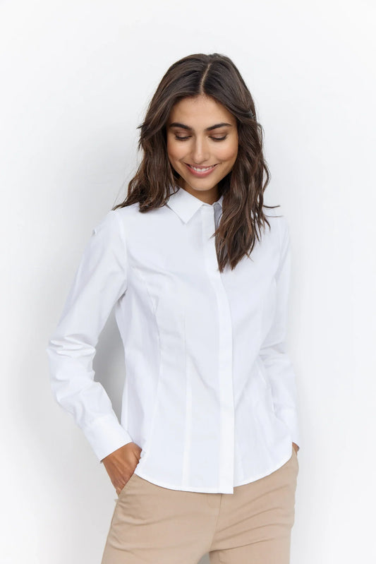 A woman wearing a Soya Concepts Classic White Button Up Shirt.