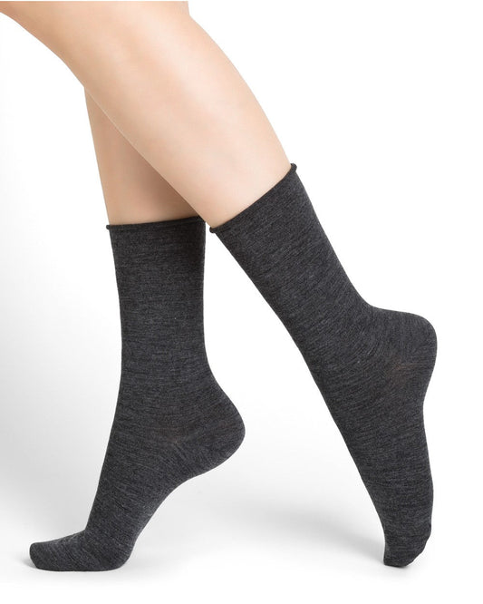 The legs of a woman wearing Bleuforet 6700 Roll Top Wool Socks.