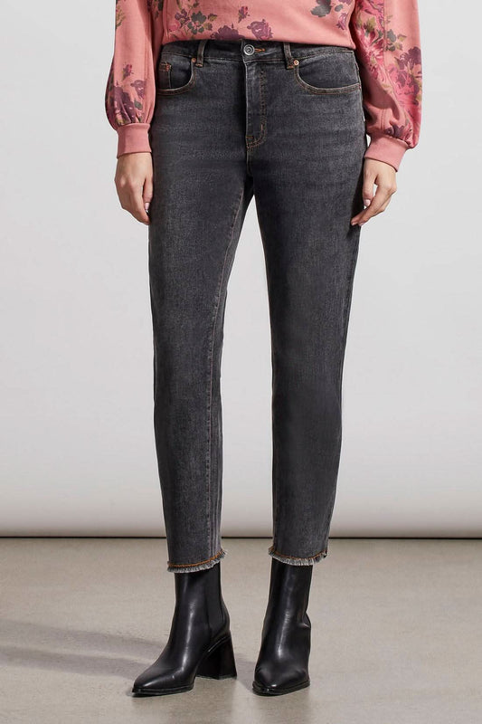 A woman wearing Tribal Audrey GF Straight Ankle Jean with a frayed bottom.
