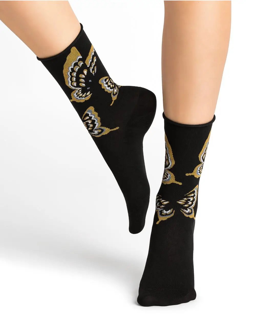A woman's legs adorned with soft and comfortable Bleuforet 6435 Velvety Butterfly Socks Black featuring birds.