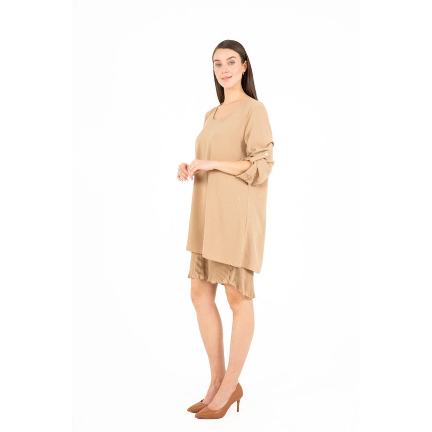 A woman in the M Made In Italy Woven Dress with Side Cuffs, featuring 3/4 sleeves, is standing against a white background.