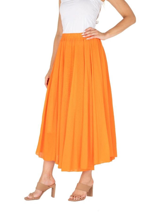 The sentence could be rewritten as: Rear view of a person in a white top and stylish M Made In Italy Tangerine Woven Skirt, paired with beige high heels.