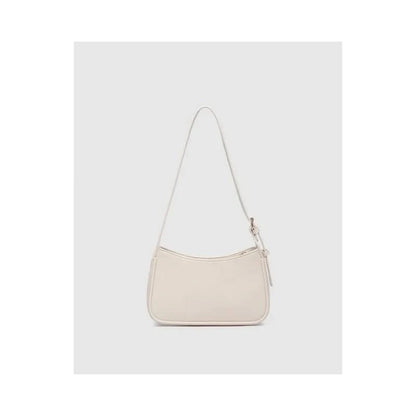 The Louenhide Ivy Shoulder Bag in Vanilla is a small, rectangular, off-white minimalist handbag with a single strap, shown against a plain light gray background.