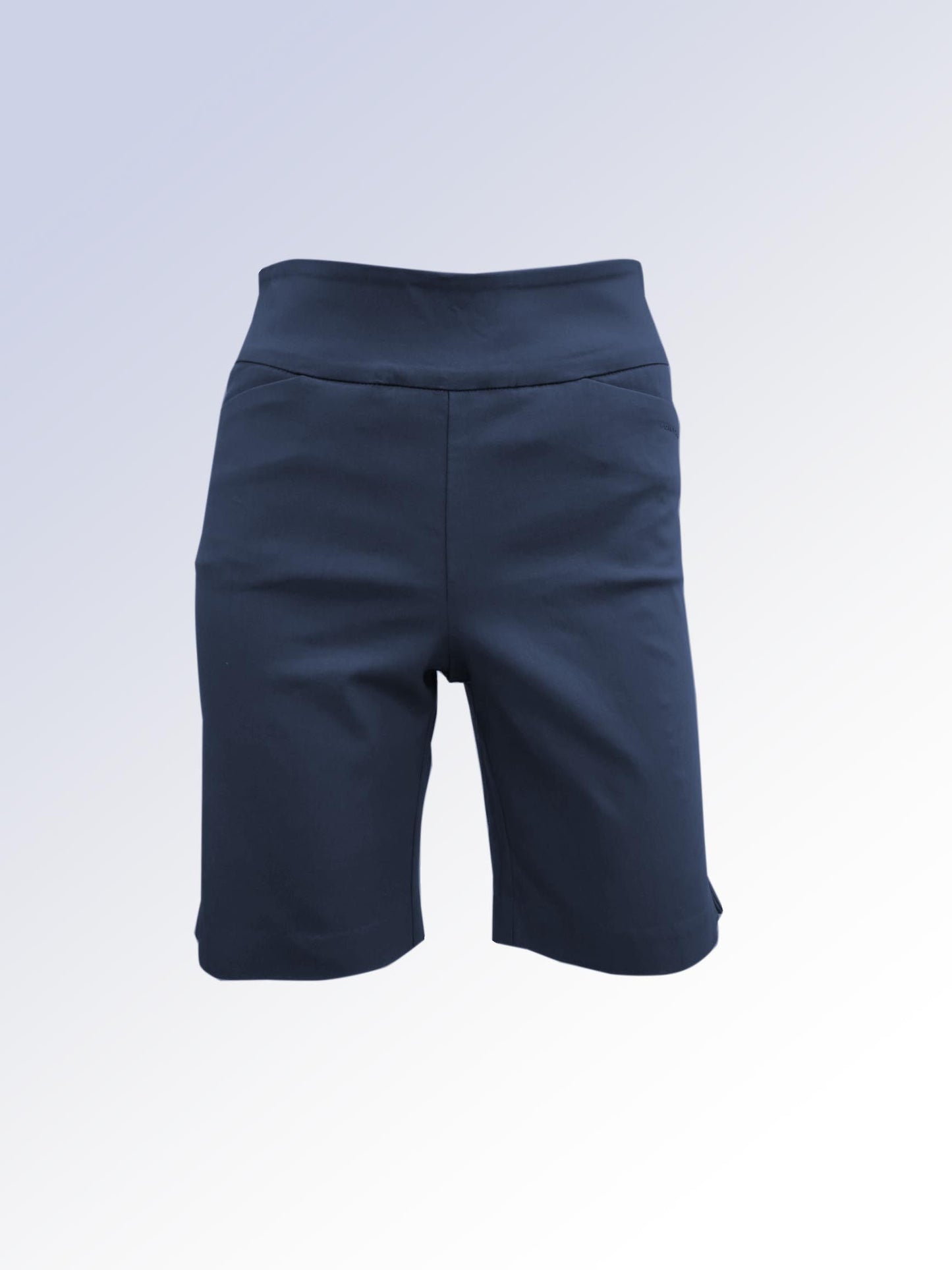 The Point Zero Pull On Bermuda Short features a wide elastic waistband and soft stretch fabric in navy blue, knee-length design, shown against a light gradient background.