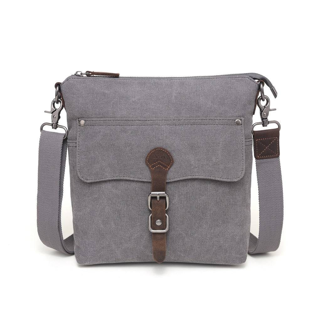 A light blue Davan water repellent crossbody bag with a leather strap and buckle-trim.