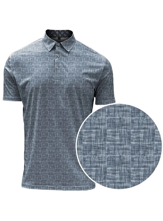 A man stands facing forward, wearing a Point Zero Mens Jersey Polo in blue, black dress pants, and black shoes against a plain white background.