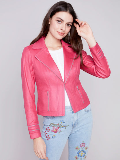 A woman wearing a yellow Charlie B Vintage Moto Faux Leather Jacket.