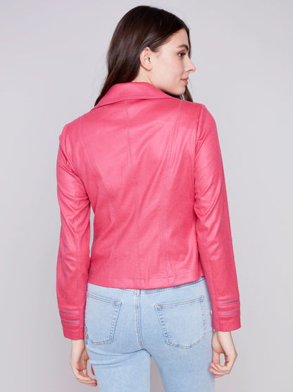 A woman wearing a yellow Charlie B Vintage Moto Faux Leather Jacket.