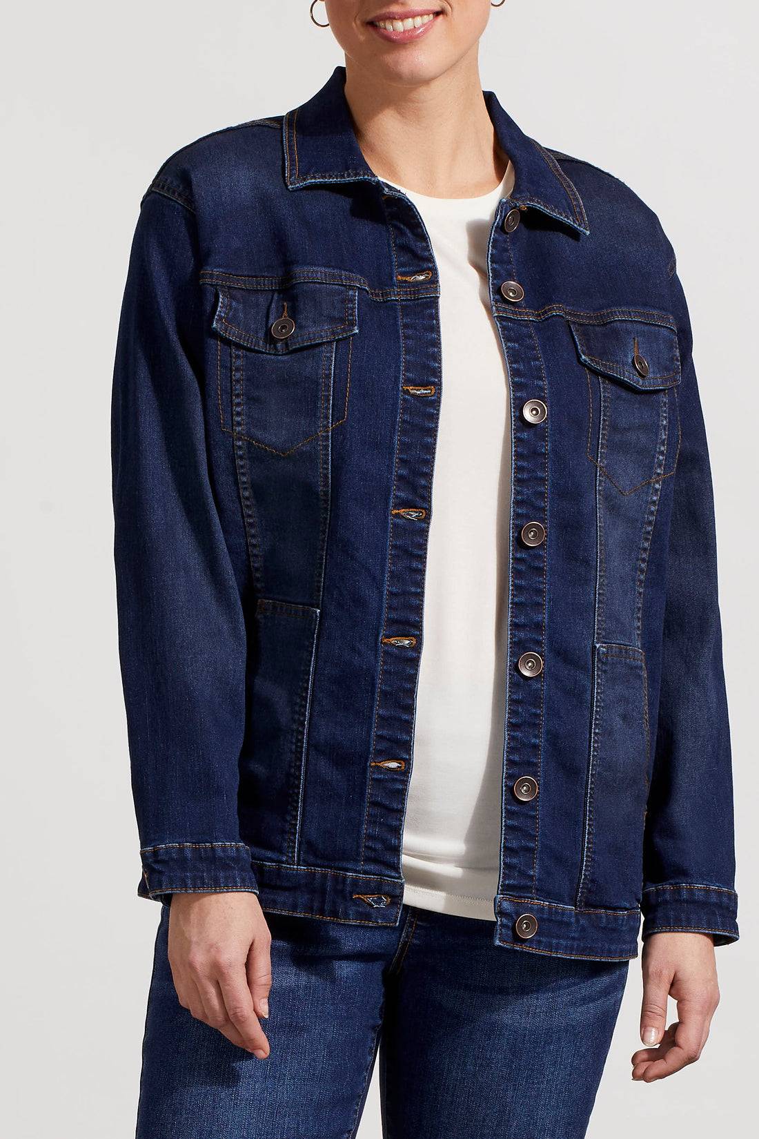 A woman in a comfortable Tribal Denim Jacket with Pockets.