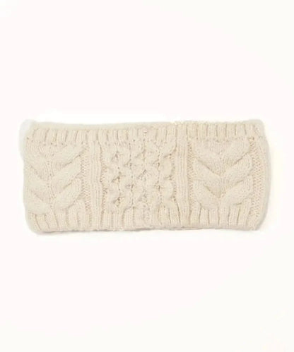 An Echo New York Recycled Wishbone Cable Headband on a white background.