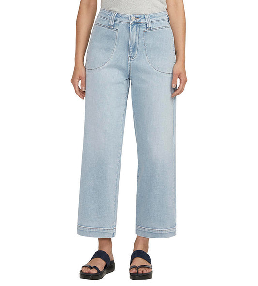 Light-wash Sophia Wide Leg Crop Jeans paired with black sandals by Jag.