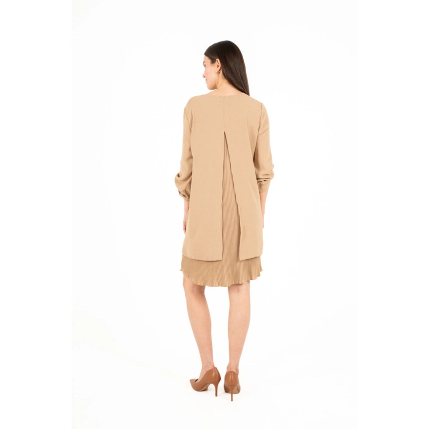 A woman in the M Made In Italy Woven Dress with Side Cuffs, featuring 3/4 sleeves, is standing against a white background.
