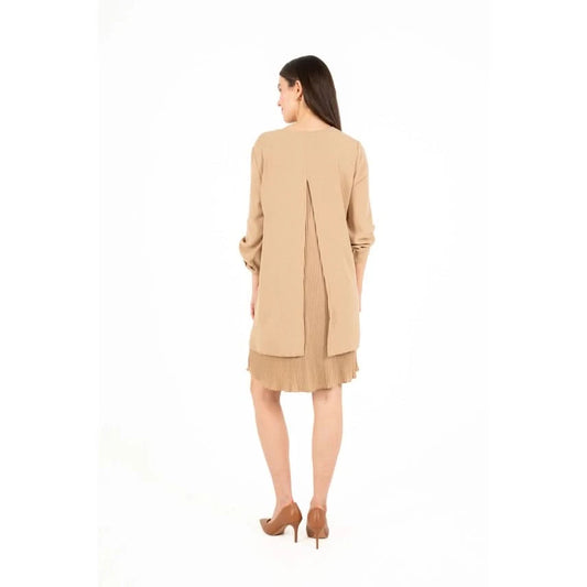 A woman in the M Made In Italy Woven Dress with Side Cuffs, featuring 3/4 sleeves, is standing against a white background.