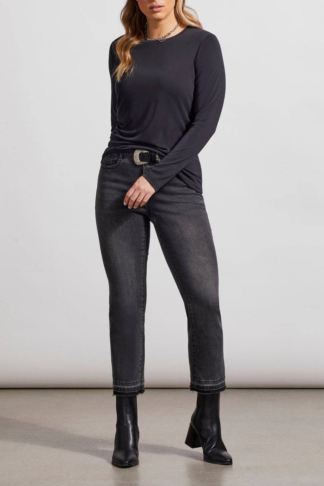 The model is wearing a stylish Tribal Crew Neck Top with Side Ruching.