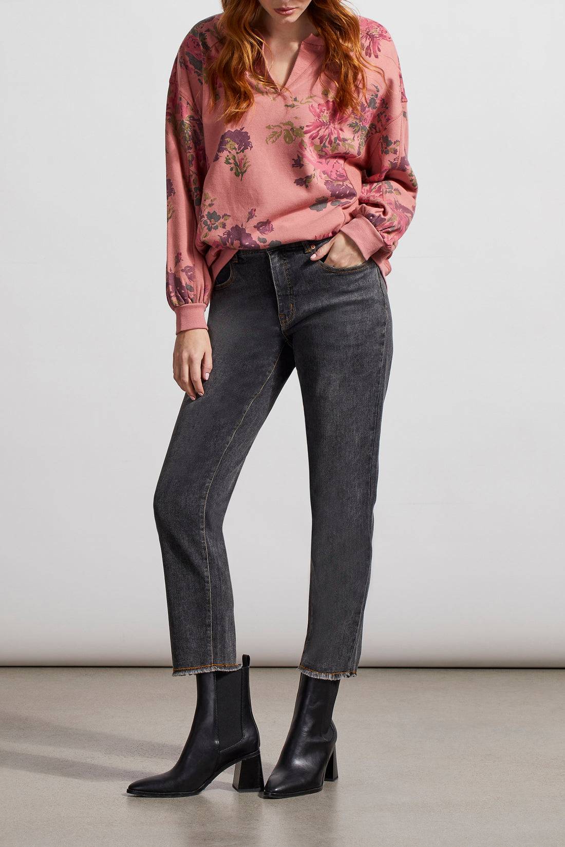 A woman wearing Tribal Audrey GF Straight Ankle Jean with a frayed bottom.