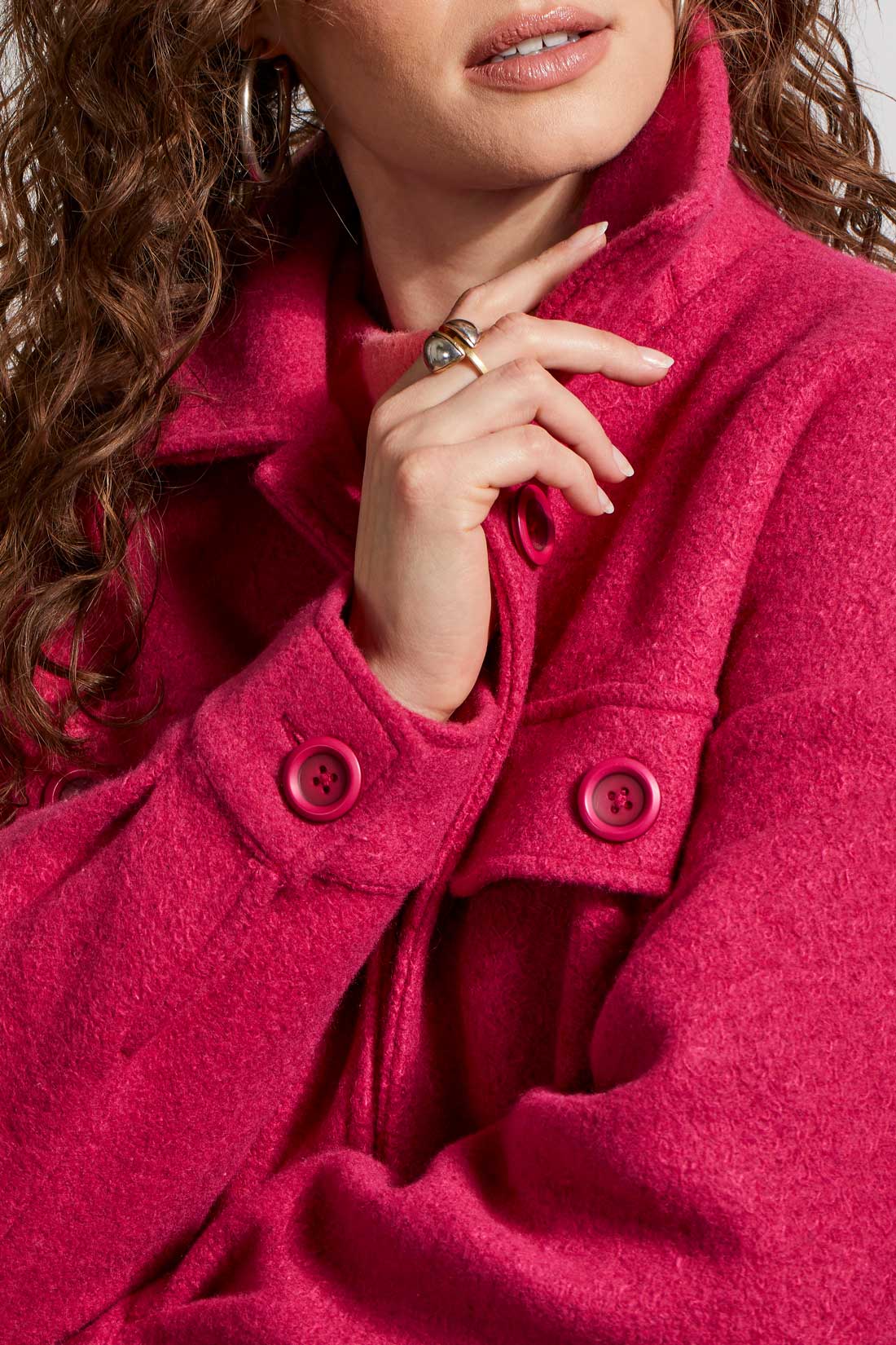A woman wearing a Tribal Stretch Wool Jacket, providing both comfort and style, paired with jeans for a relaxed yet fashionable look.
